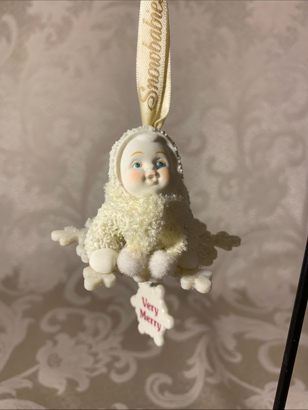 Department 56 Cream Snowflake Baby Ornament with Blue Eyes